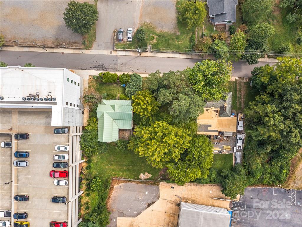 21 Pearl Street Asheville, NC 28801 - Photo 17 of 26 an aerial view of residential houses with outdoor space and river