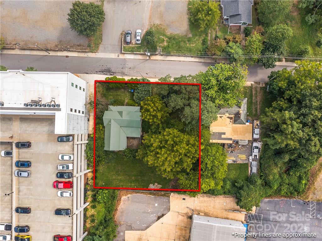 21 Pearl Street Asheville, NC 28801 - Photo 22 of 26 an aerial view of residential houses with outdoor space and trees
