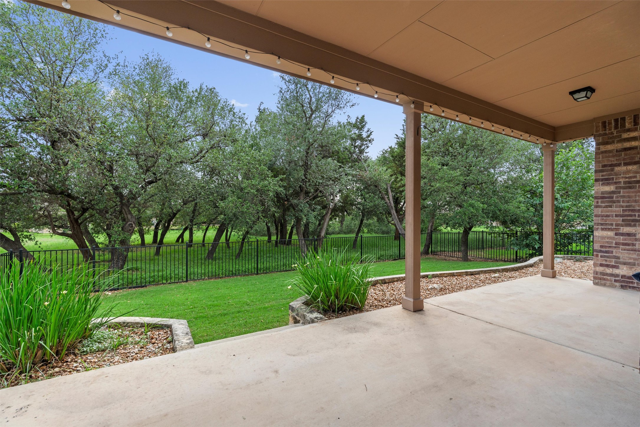 108 Calhoun Lane Georgetown, TX 78633 - Photo 29 of 32 a view of a backyard with green space