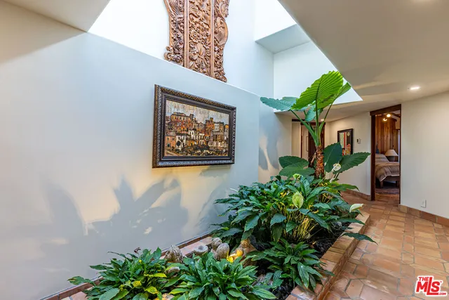 a picture of a flower in a room