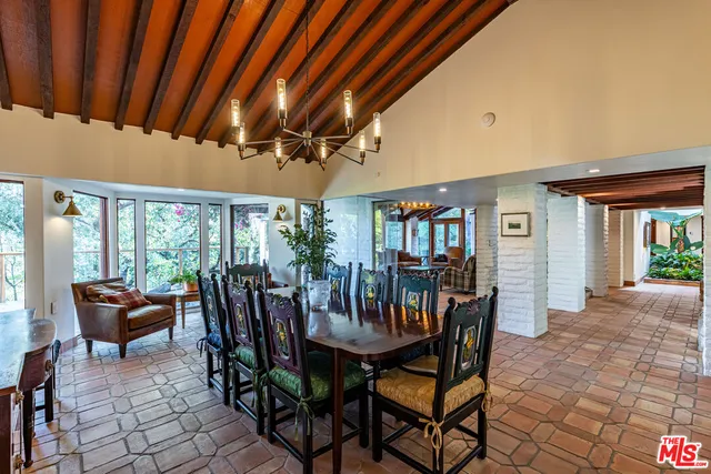 a view of an outside dining space with furniture window