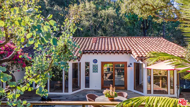 a view of a cafe with sitting area