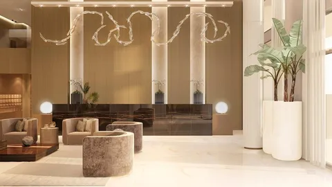 a living room with a couch and a potted plant