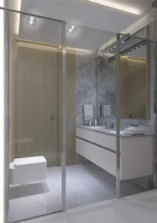 a bathroom with a shower and a sink