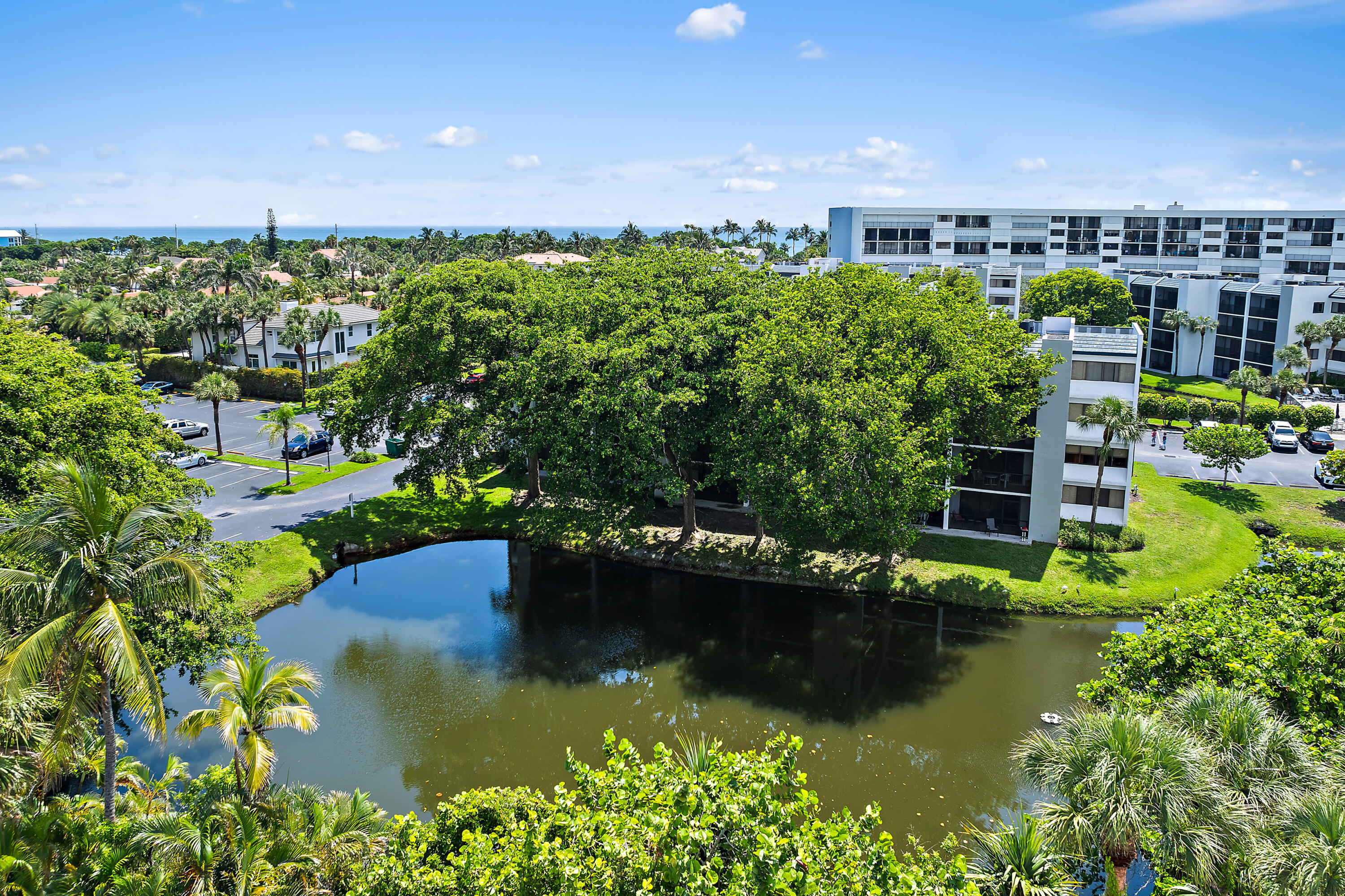 1605 Highway 1, Unit E203 Jupiter, FL 33477 - Photo 2 of 28 a view of a lake with a city