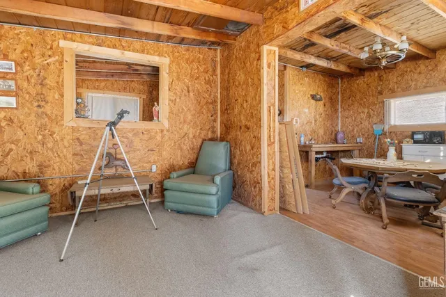 a balcony with furniture and a window