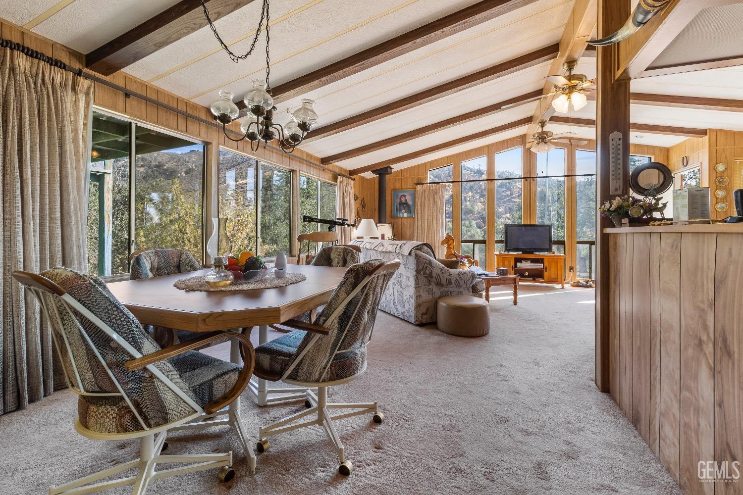 Undisclosed Address Caliente, CA 93518 - Photo 32 of 37 a view of a dining room with furniture window and outside view