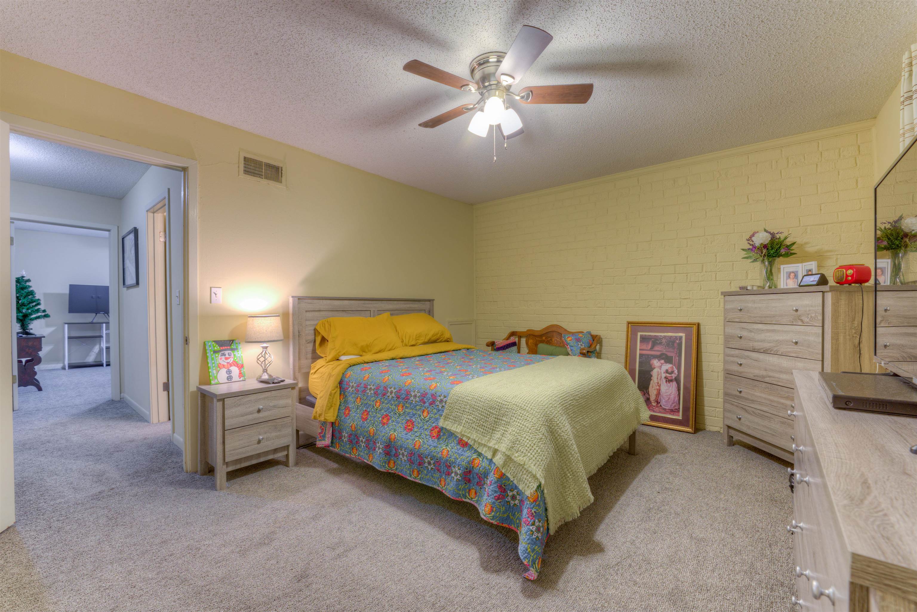 997 June Road Memphis, TN 38119 - Photo 13 of 30 a bedroom with a bed and a chandelier