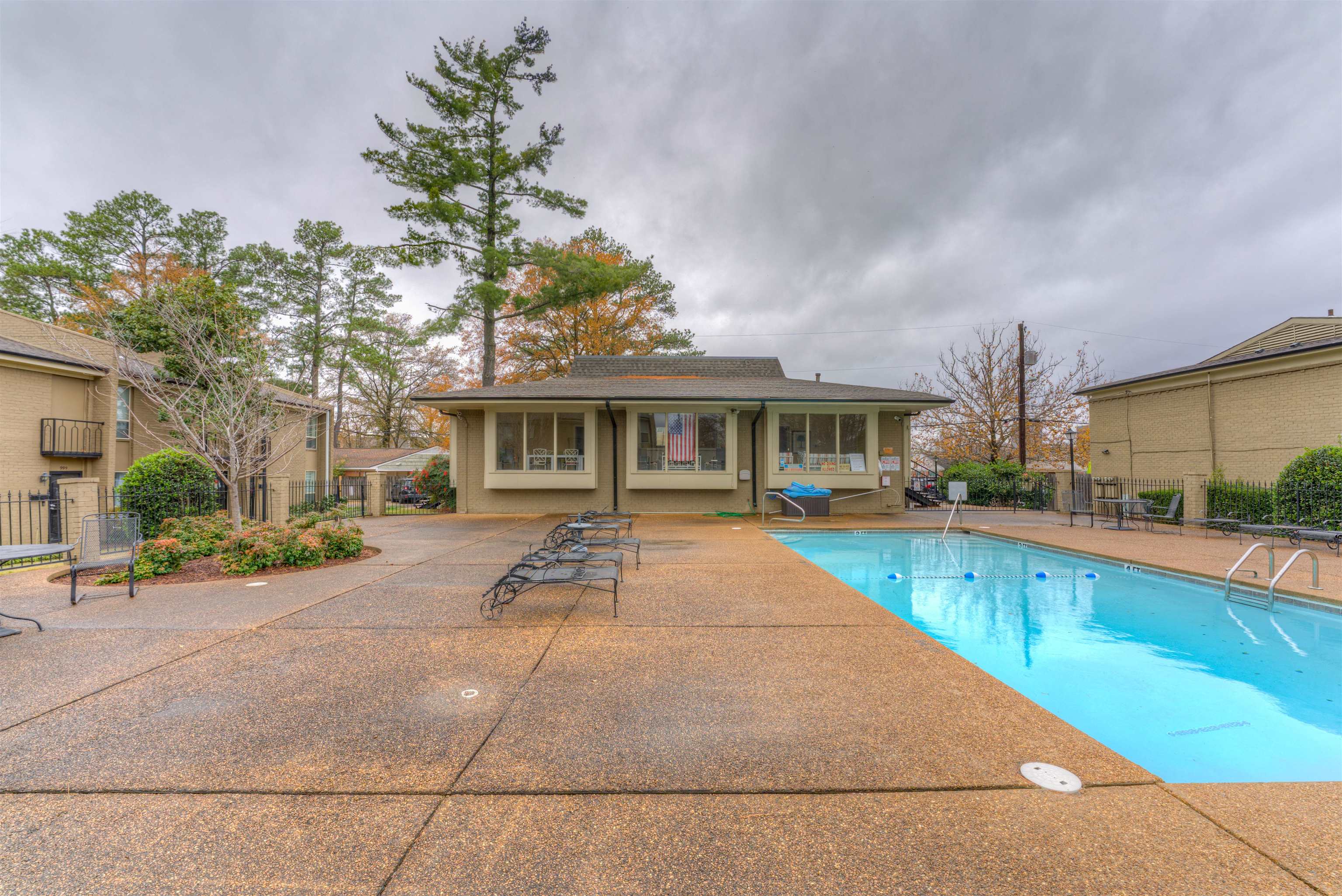 997 June Road Memphis, TN 38119 - Photo 22 of 30 a view of a house with swimming pool and sitting area