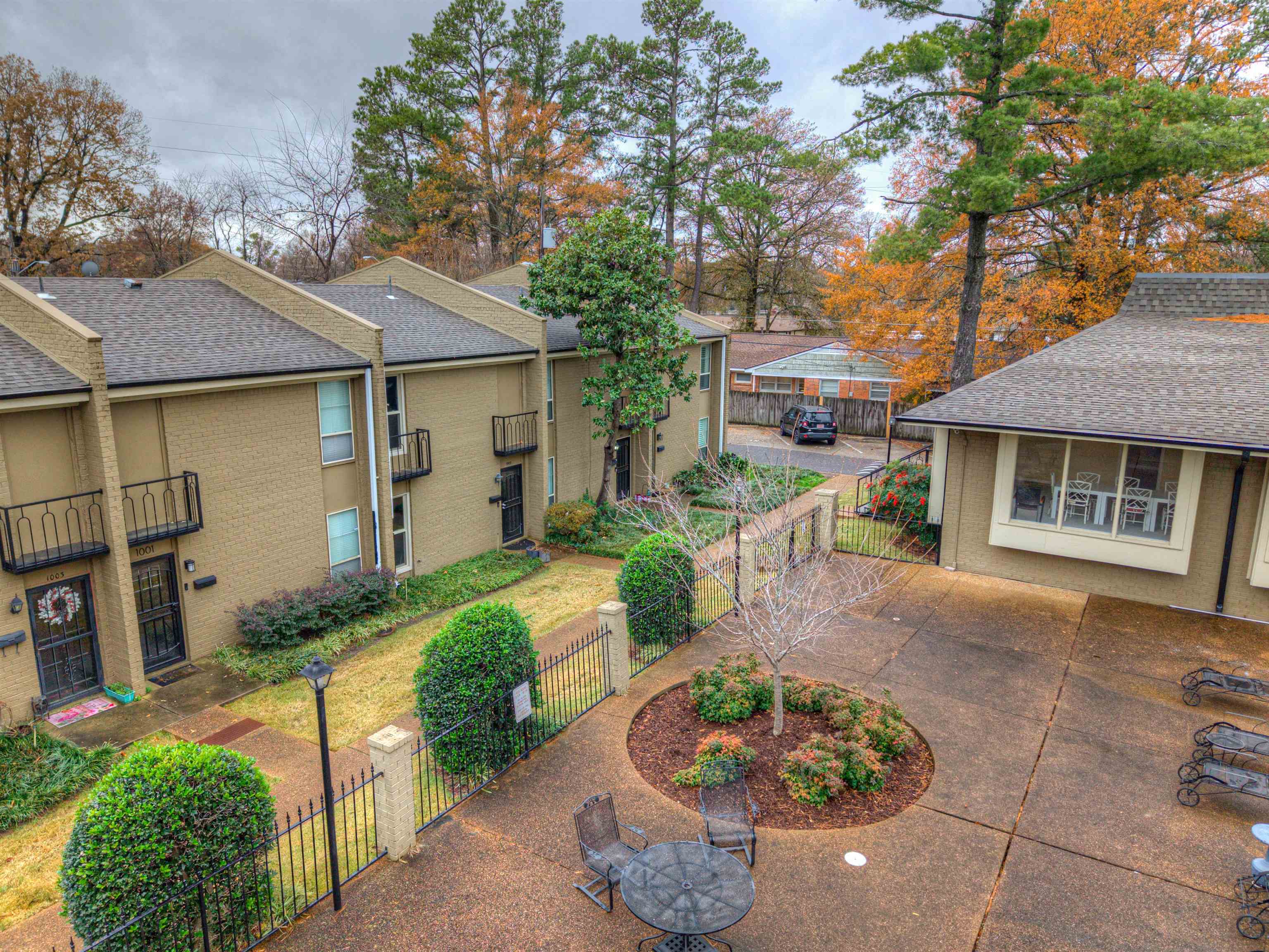 997 June Road Memphis, TN 38119 - Photo 29 of 30 a view of a house with a yard and a garden