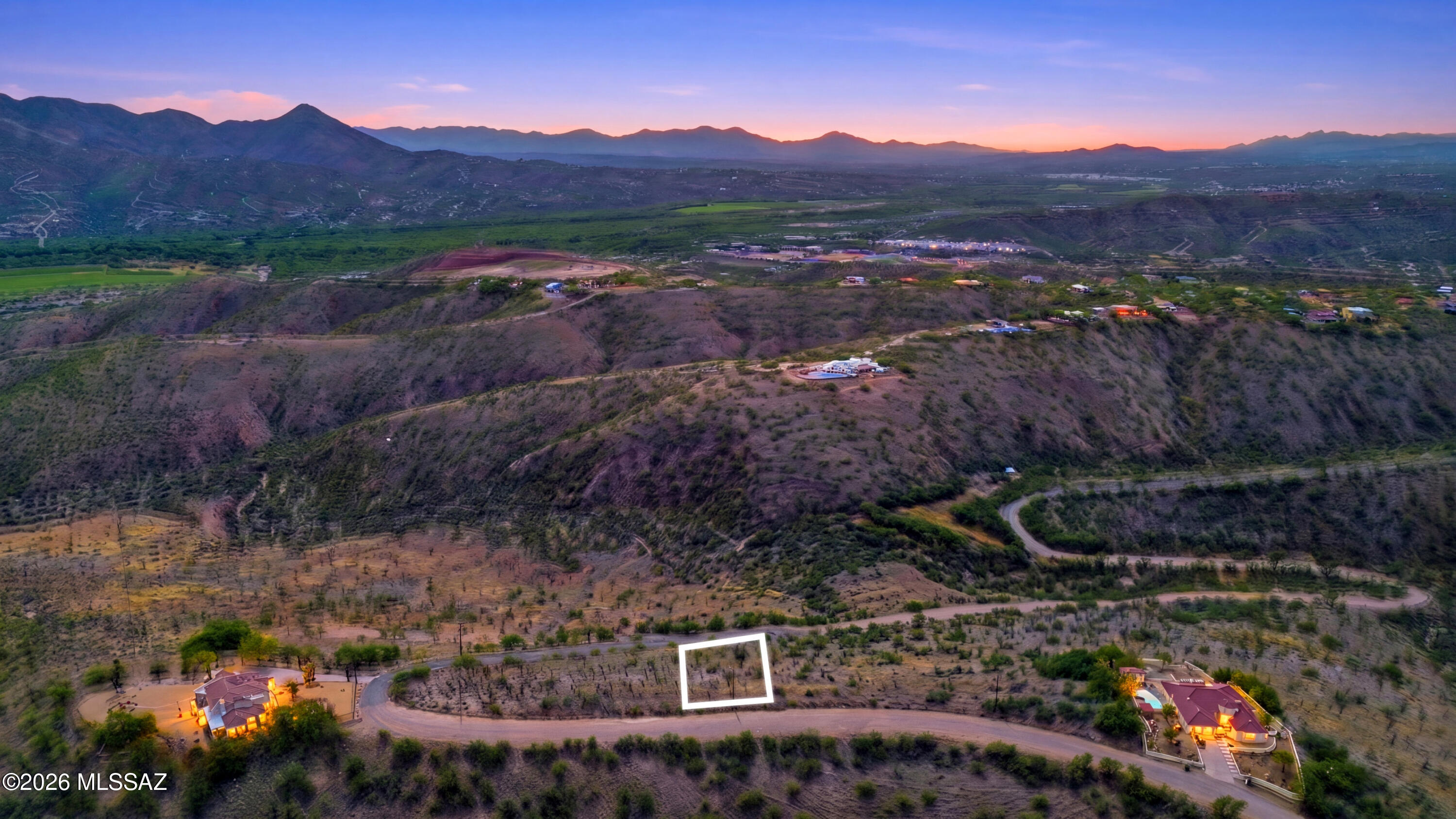 1525 Circulo Jacona, Unit 32 Rio Rico, AZ 85648 - Photo 4 of 13 a view of a lush green hillside and houses