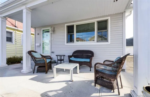 a building outdoor space with patio furniture