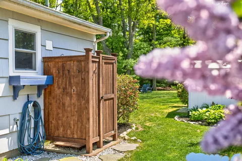 a view of a back yard of the house