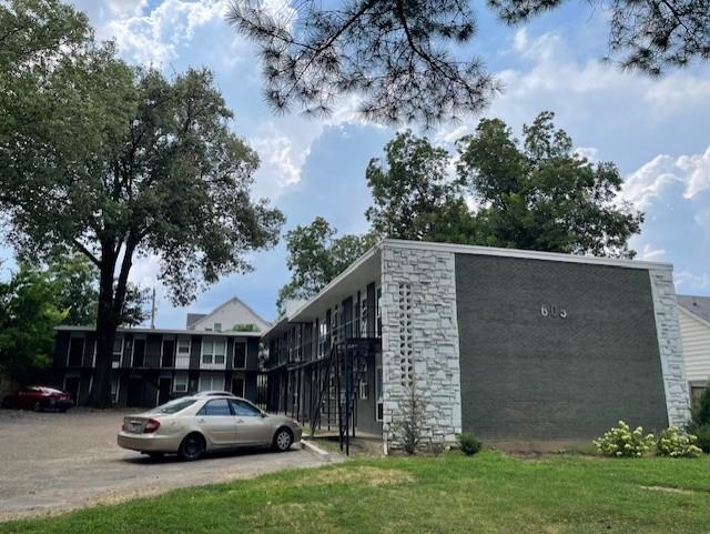 605 Patterson Street, Unit 7 Memphis, TN 38111 - Photo 1 of 10 a front view of a house with garden