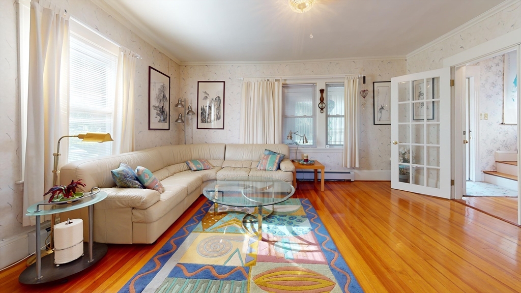 118 Colby Road Quincy, MA 02171 - Photo 13 of 40 a living room with furniture and wooden floor