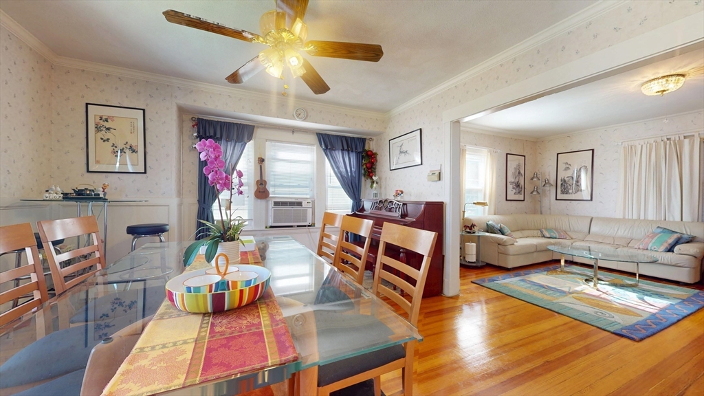 118 Colby Road Quincy, MA 02171 - Photo 15 of 40 a living room with furniture and a wooden floor