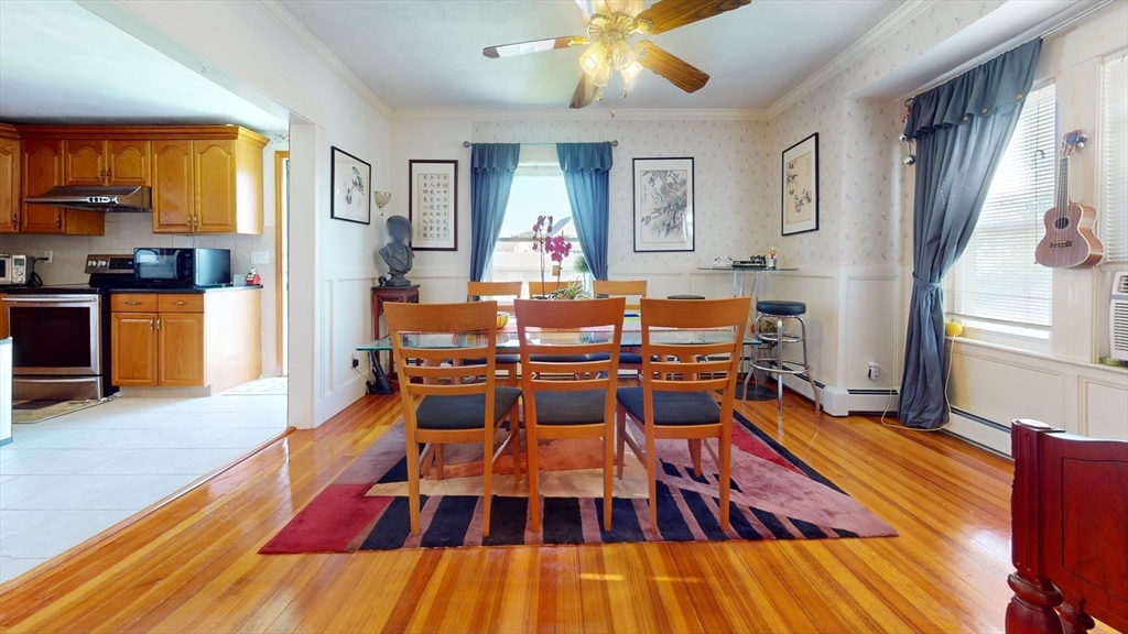 118 Colby Road Quincy, MA 02171 - Photo 16 of 40 a living room with furniture and wooden floor