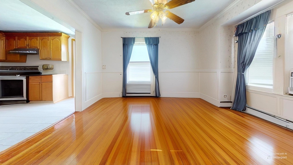 118 Colby Road Quincy, MA 02171 - Photo 19 of 40 wooden floor in an empty room with a window
