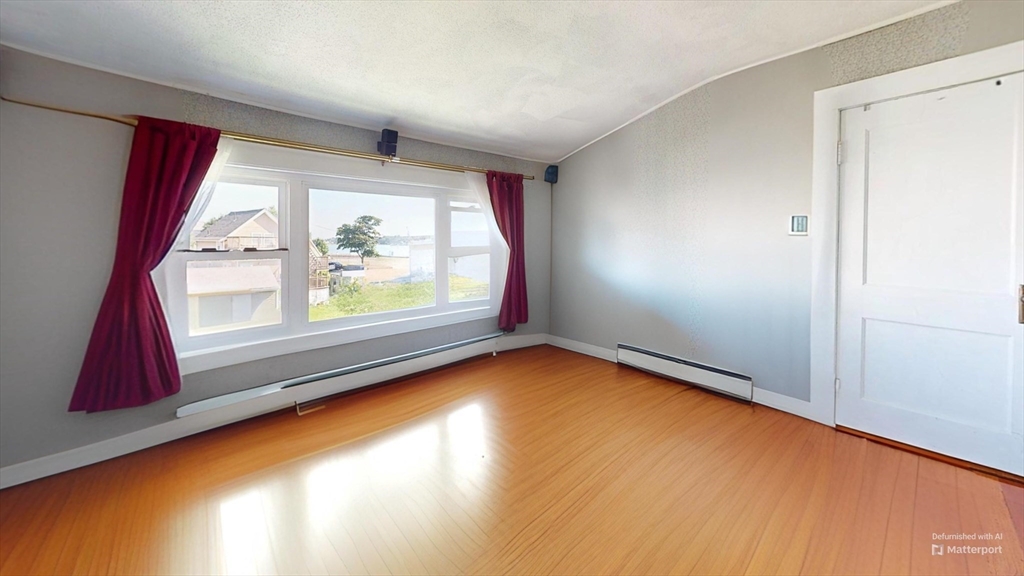 118 Colby Road Quincy, MA 02171 - Photo 27 of 40 an empty room with window