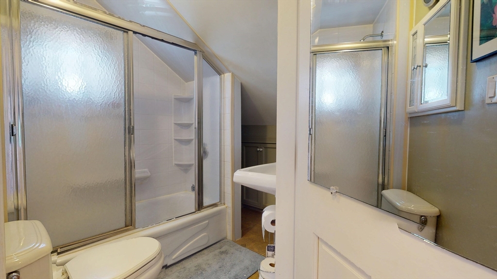 118 Colby Road Quincy, MA 02171 - Photo 32 of 40 a bathroom with a toilet and a shower