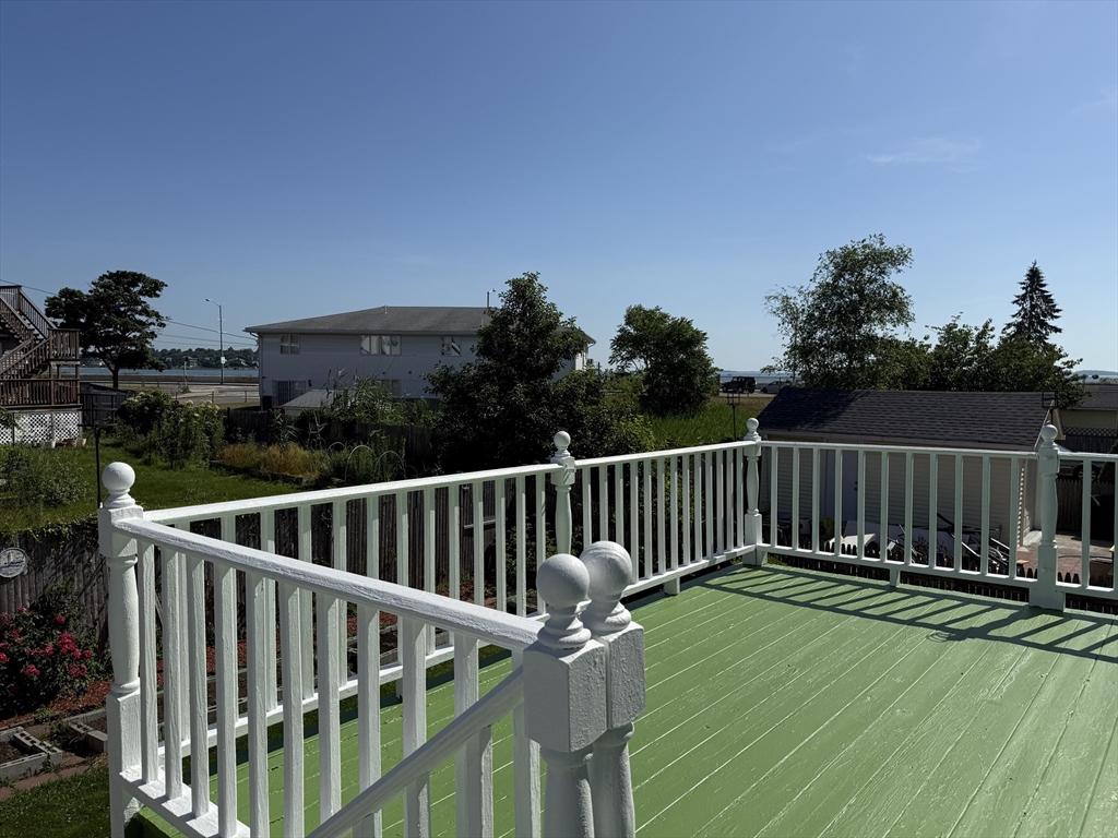 118 Colby Road Quincy, MA 02171 - Photo 8 of 40 a view of deck and wooden fence