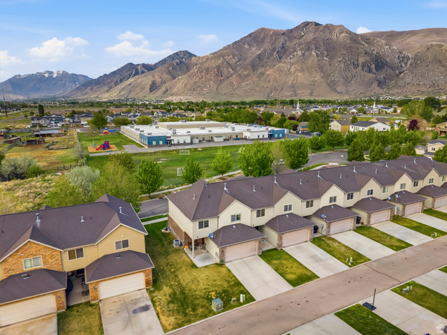 1165 West 100 South Springville, UT 84663 - Photo 18 of 28 Aerial view of residential area with a mountainous background