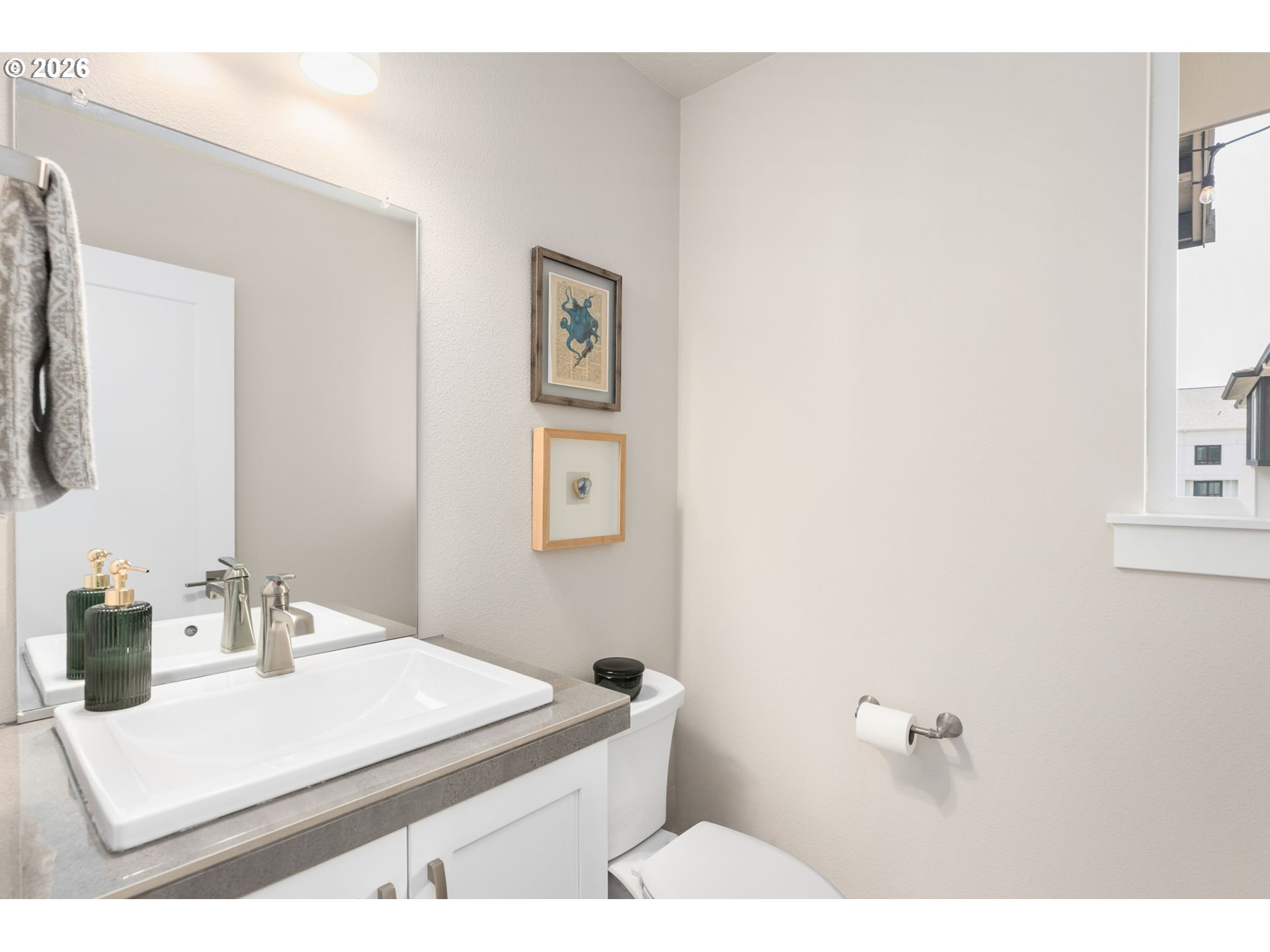 17312 Southwest Kite Lane Beaverton, OR 97007 - Photo 16 of 37 a bathroom with a sink toilet and mirror