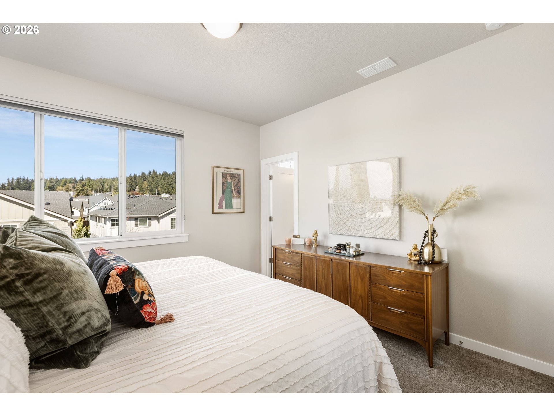 17312 Southwest Kite Lane Beaverton, OR 97007 - Photo 22 of 37 a bedroom with a bed and wooden floor