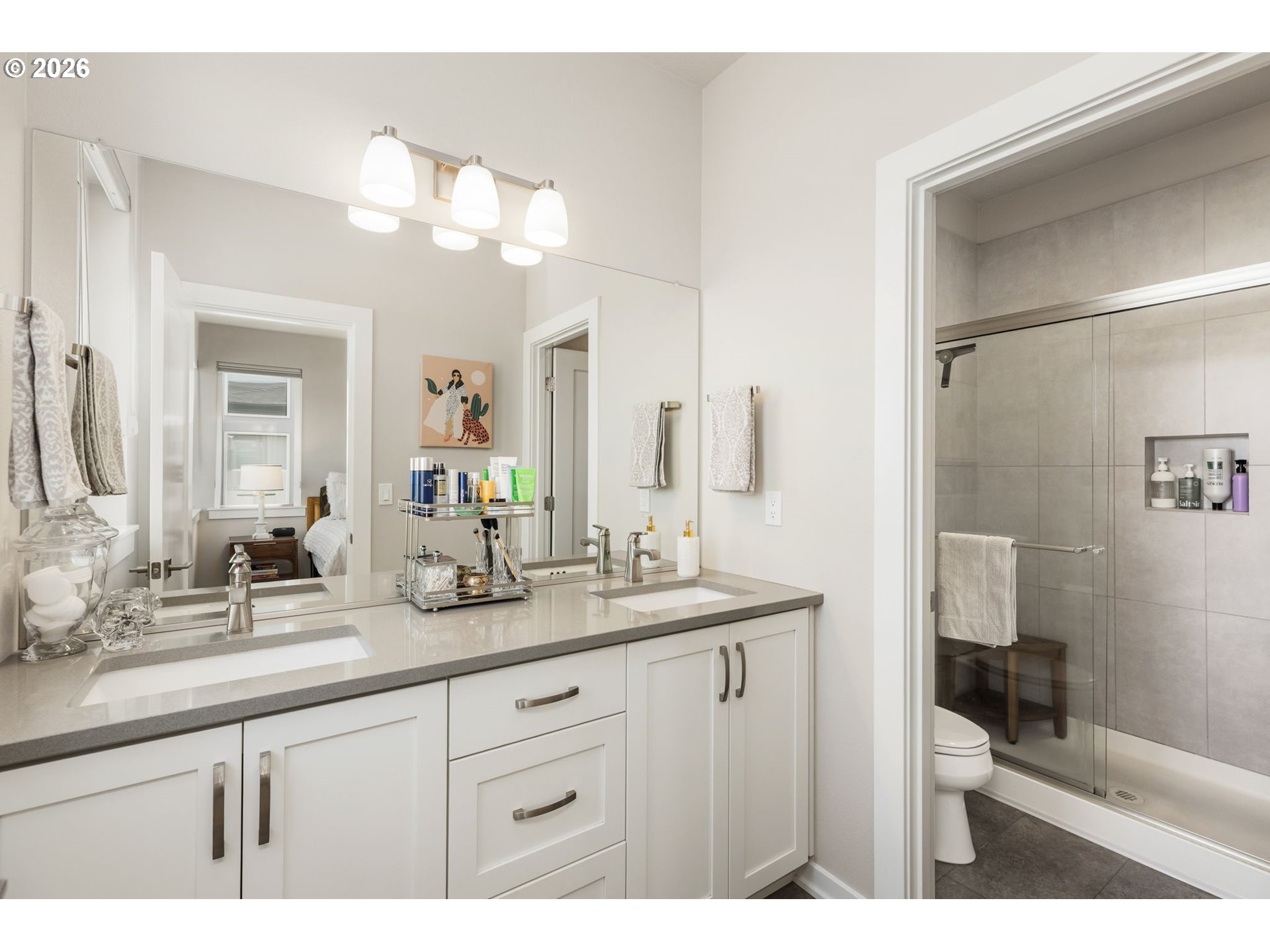 17312 Southwest Kite Lane Beaverton, OR 97007 - Photo 23 of 37 a bathroom with a sink a toilet and a mirror