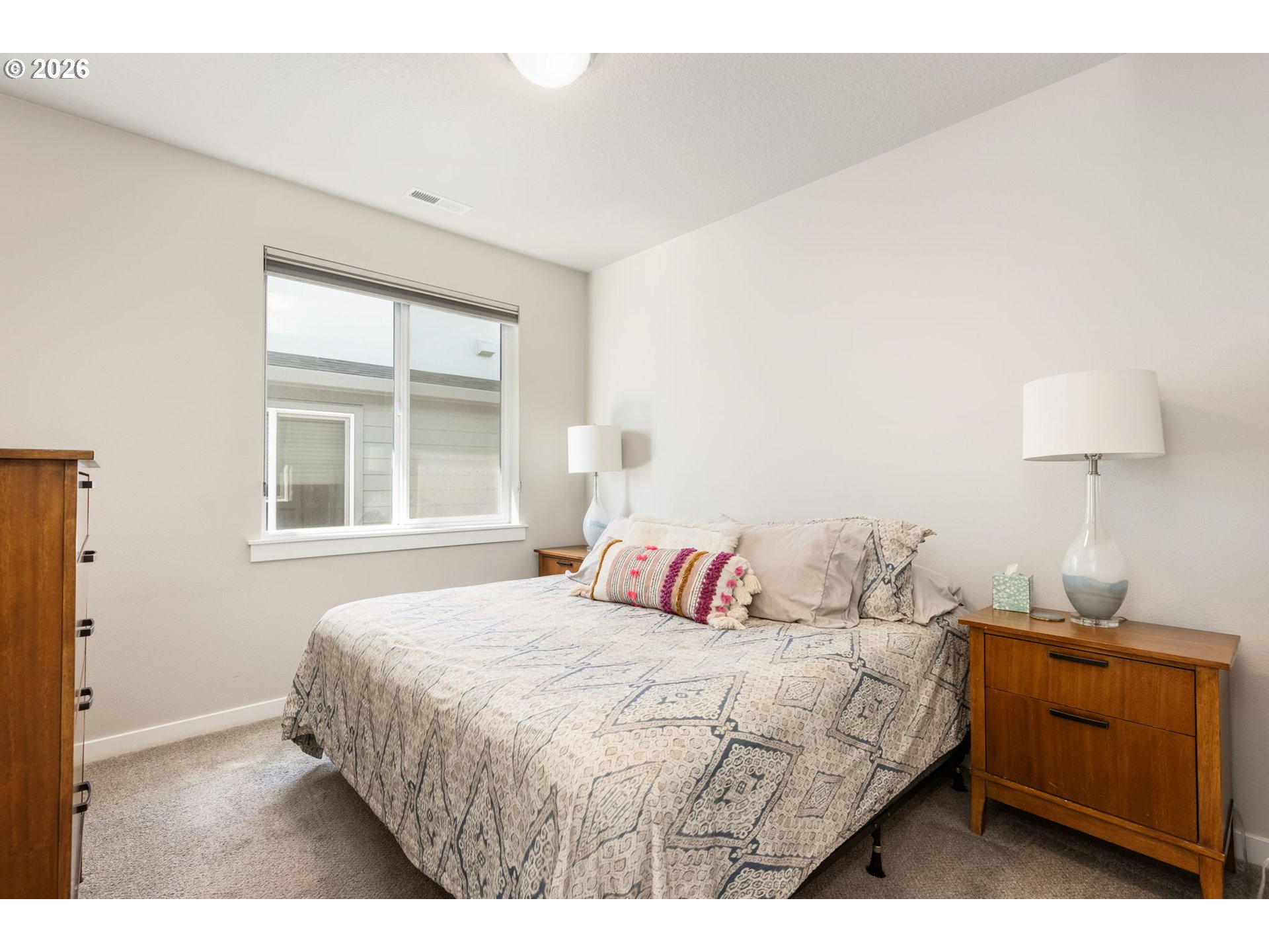 17312 Southwest Kite Lane Beaverton, OR 97007 - Photo 25 of 37 a bedroom with a bed and a window