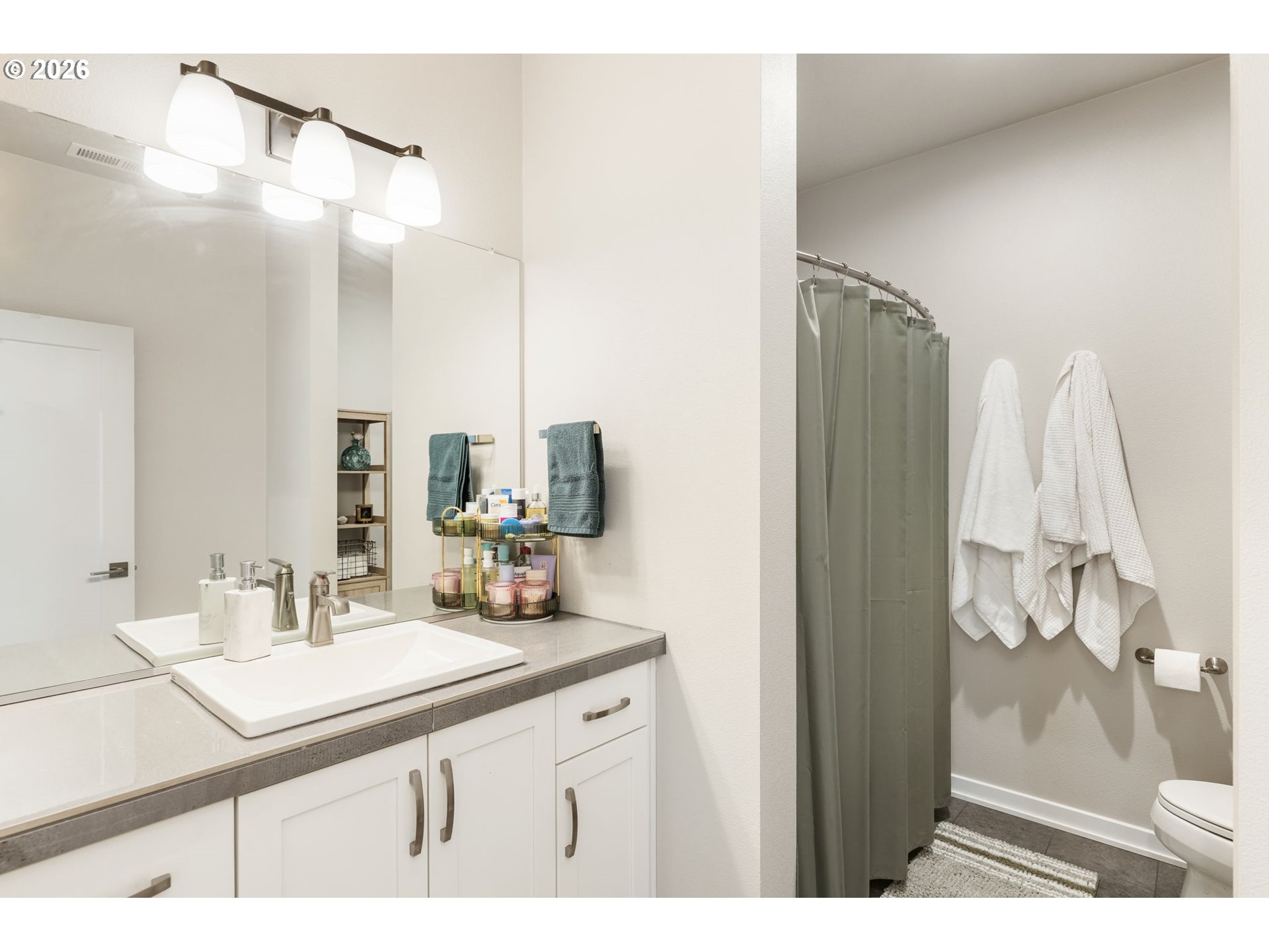 17312 Southwest Kite Lane Beaverton, OR 97007 - Photo 26 of 37 a bathroom with a sink and a mirror