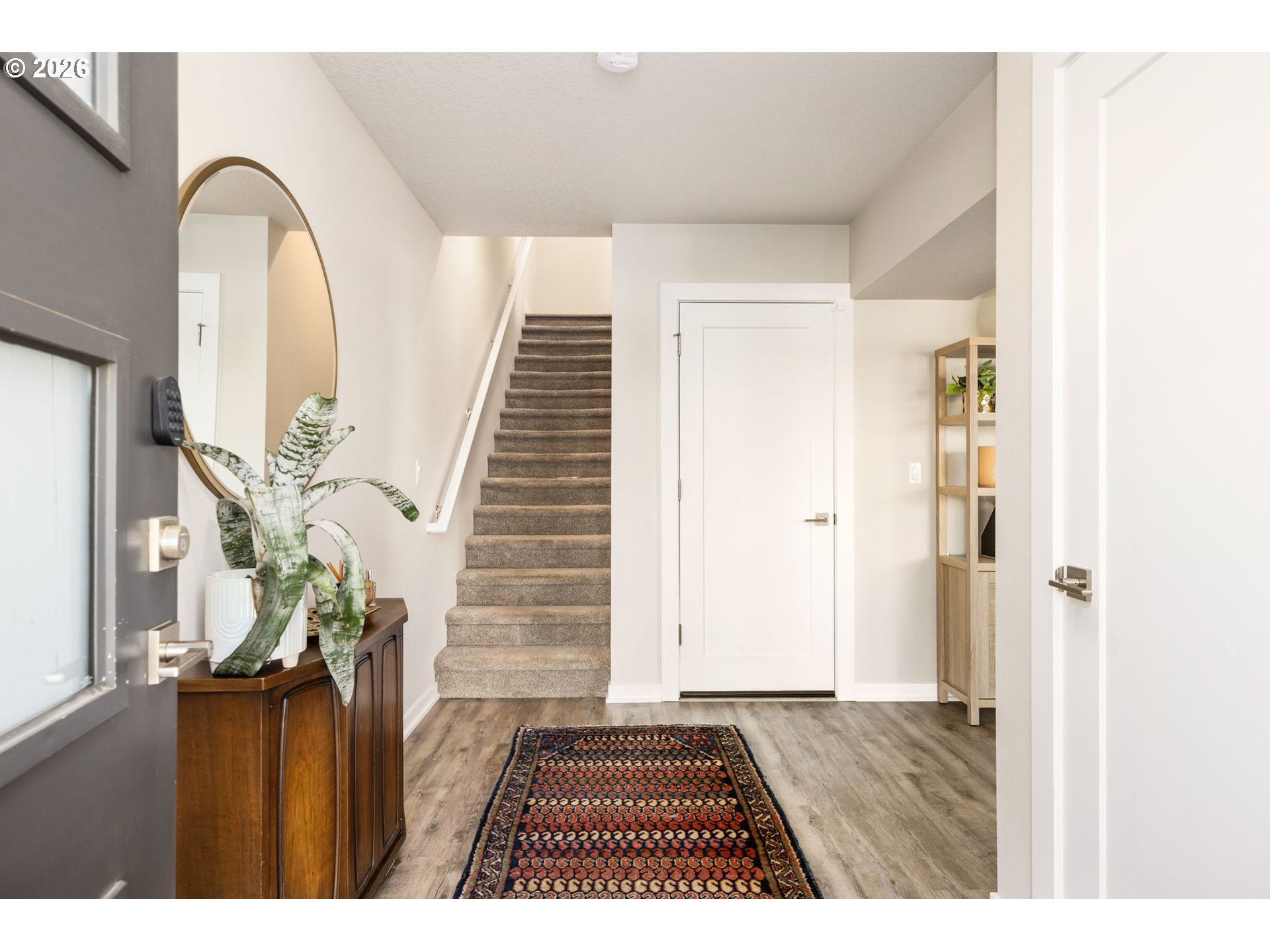 17312 Southwest Kite Lane Beaverton, OR 97007 - Photo 4 of 37 a view of an entryway with wooden floor