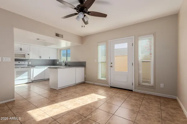 an empty room with a fireplace