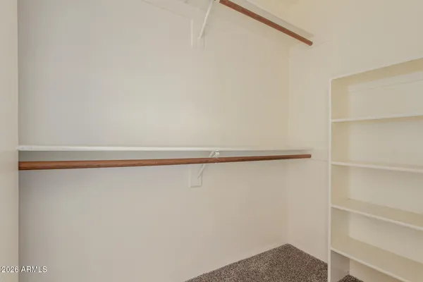 a view of empty room with windows