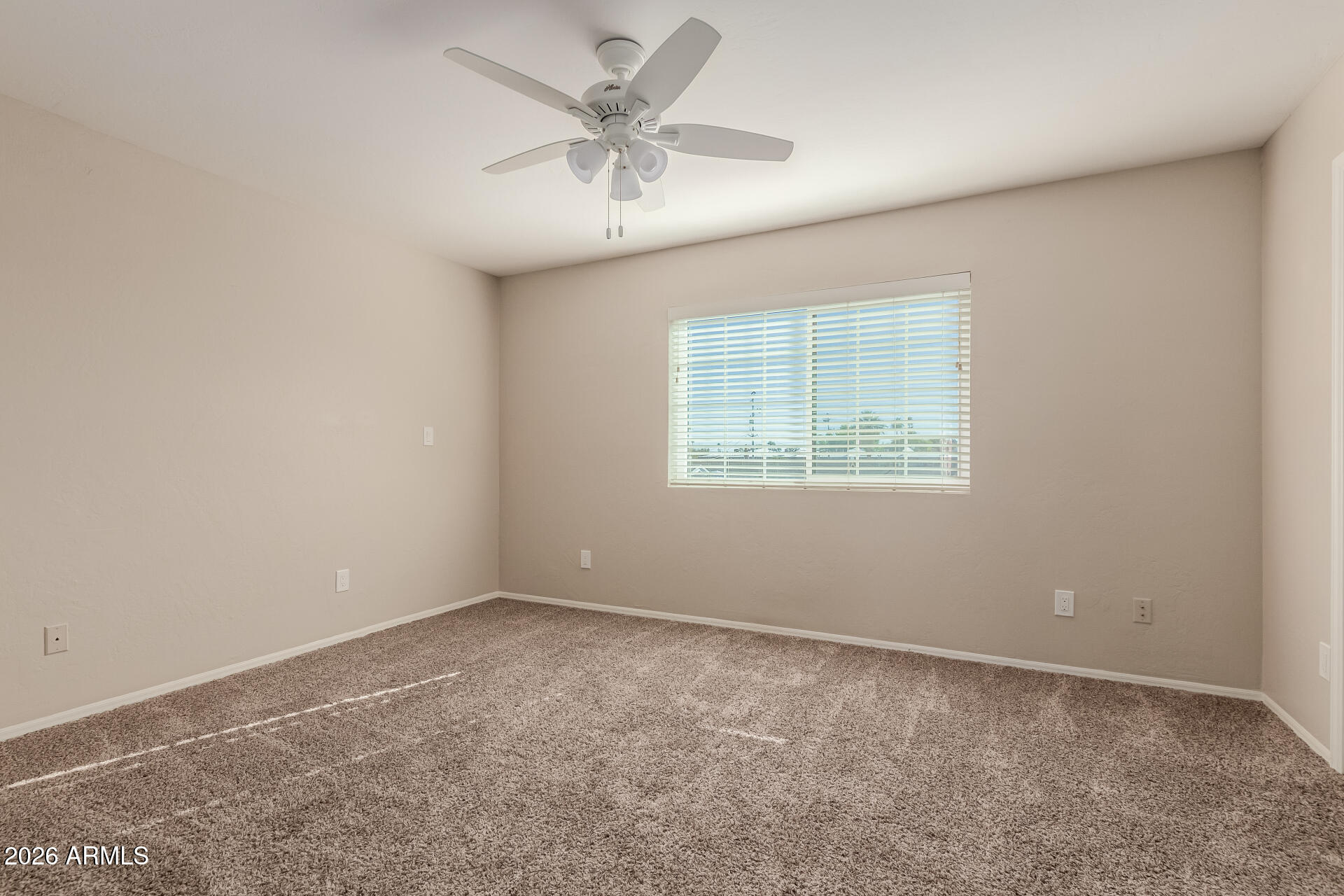 6223 North 12th Street, Unit 2 Phoenix, AZ 85014 - Photo 20 of 38 an empty room with a window