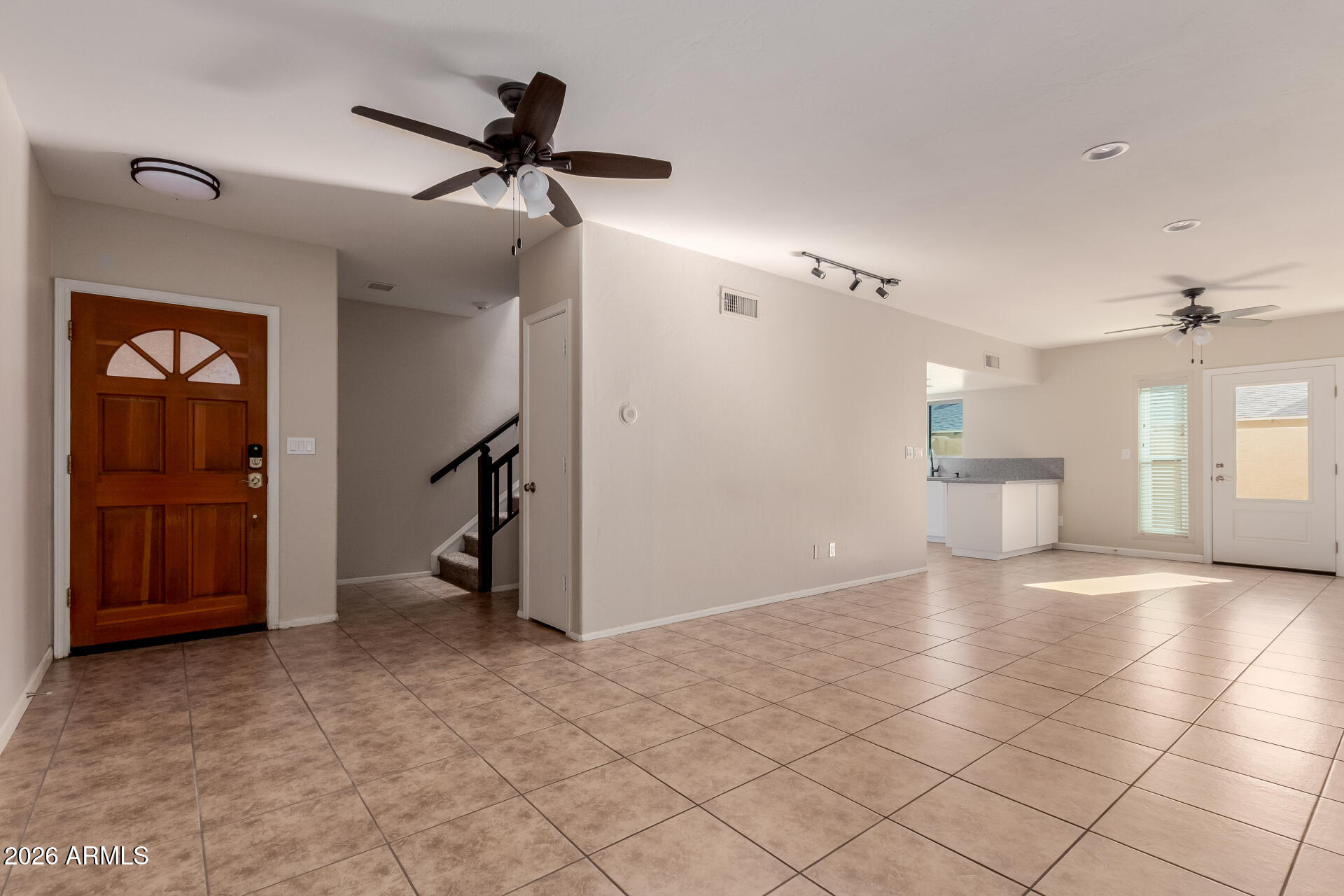 6223 North 12th Street, Unit 2 Phoenix, AZ 85014 - Photo 3 of 38 a view of a livingroom with a furniture and a ceiling fan