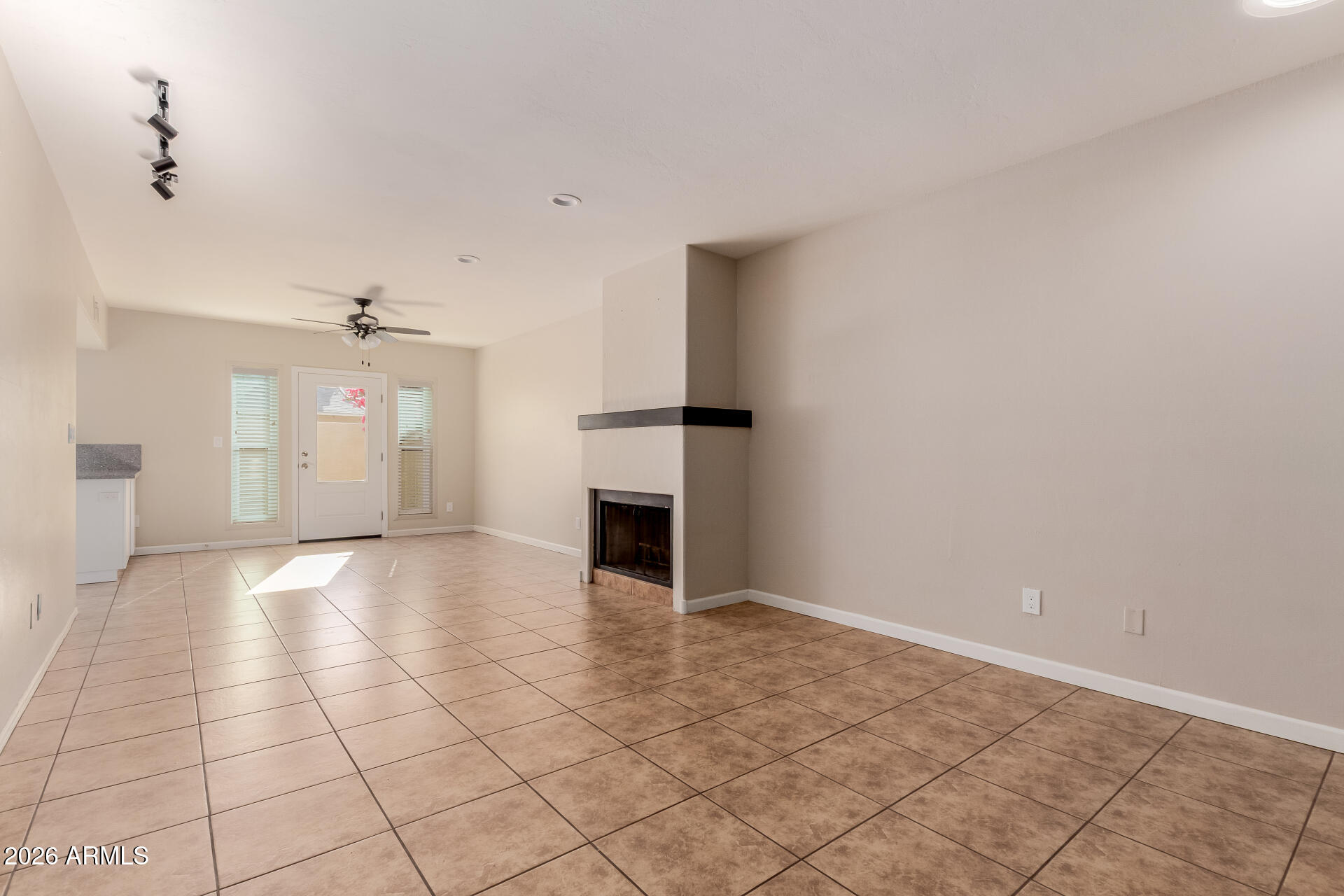 6223 North 12th Street, Unit 2 Phoenix, AZ 85014 - Photo 6 of 38 wooden floor in an empty room with a fireplace