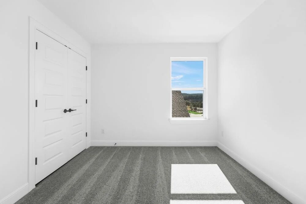 1217 Novara Trail Leander, TX 78641 - Photo 18 of 40 a view of an empty room with a window