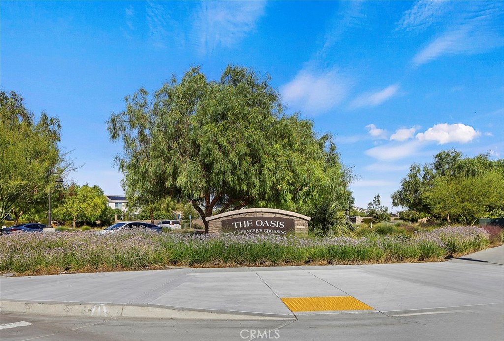 34709 Candlestick Circle Murrieta, CA 92563 - Photo 34 of 40 a view of a street with a building in the background