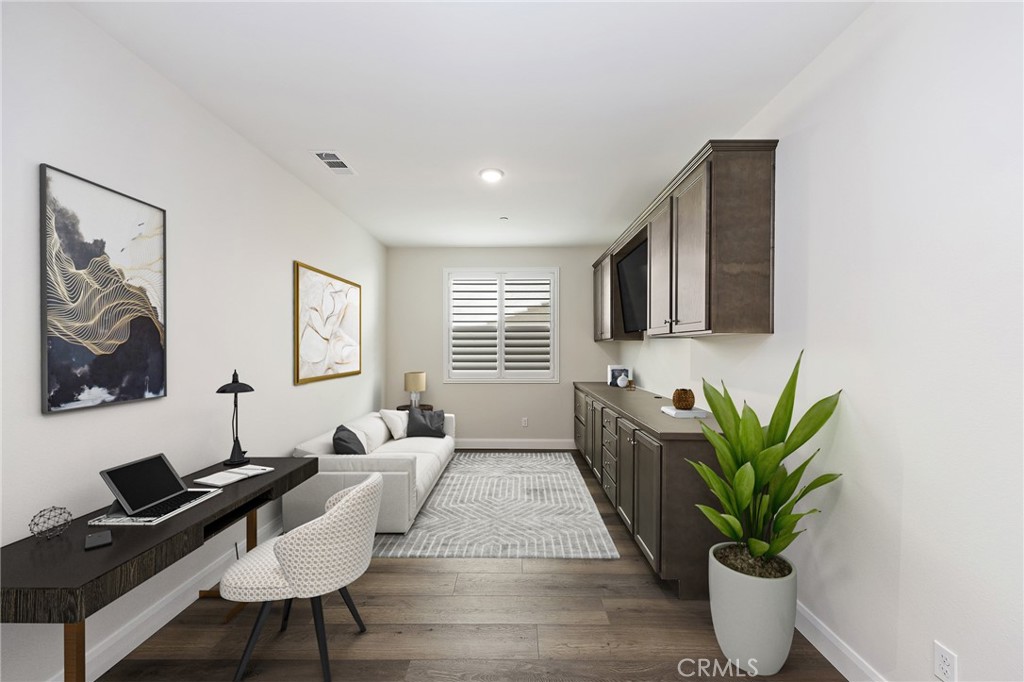34709 Candlestick Circle Murrieta, CA 92563 - Photo 4 of 40 a living room with furniture potted plant and a window