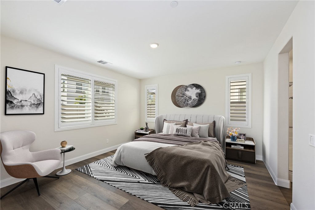 34709 Candlestick Circle Murrieta, CA 92563 - Photo 5 of 40 a bedroom with a bed and a chandelier