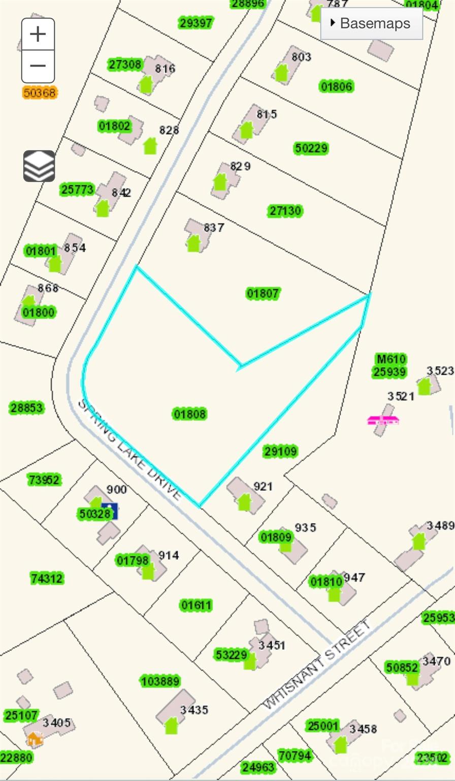 0 Spring Lake Drive Iron Station, NC 28080 - Photo 10 of 10 a room that has a baby bed and a table in it