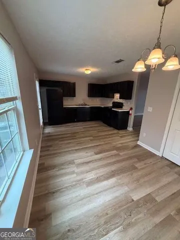 a large room with wooden floor