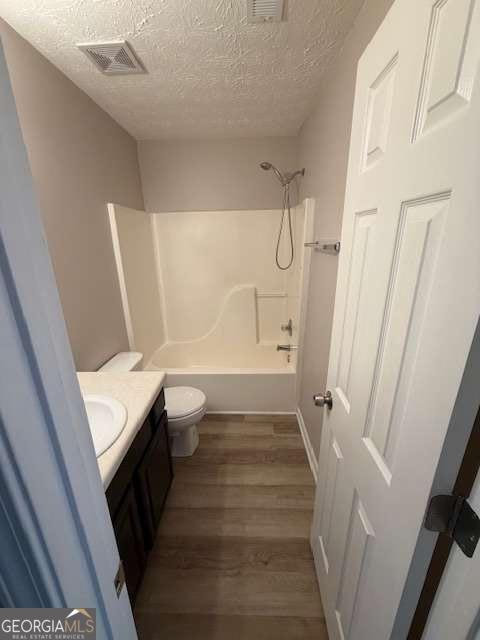 150 Blake Avenue Jackson, GA 30233 - Photo 10 of 12 a bathroom with a sink a toilet and shower