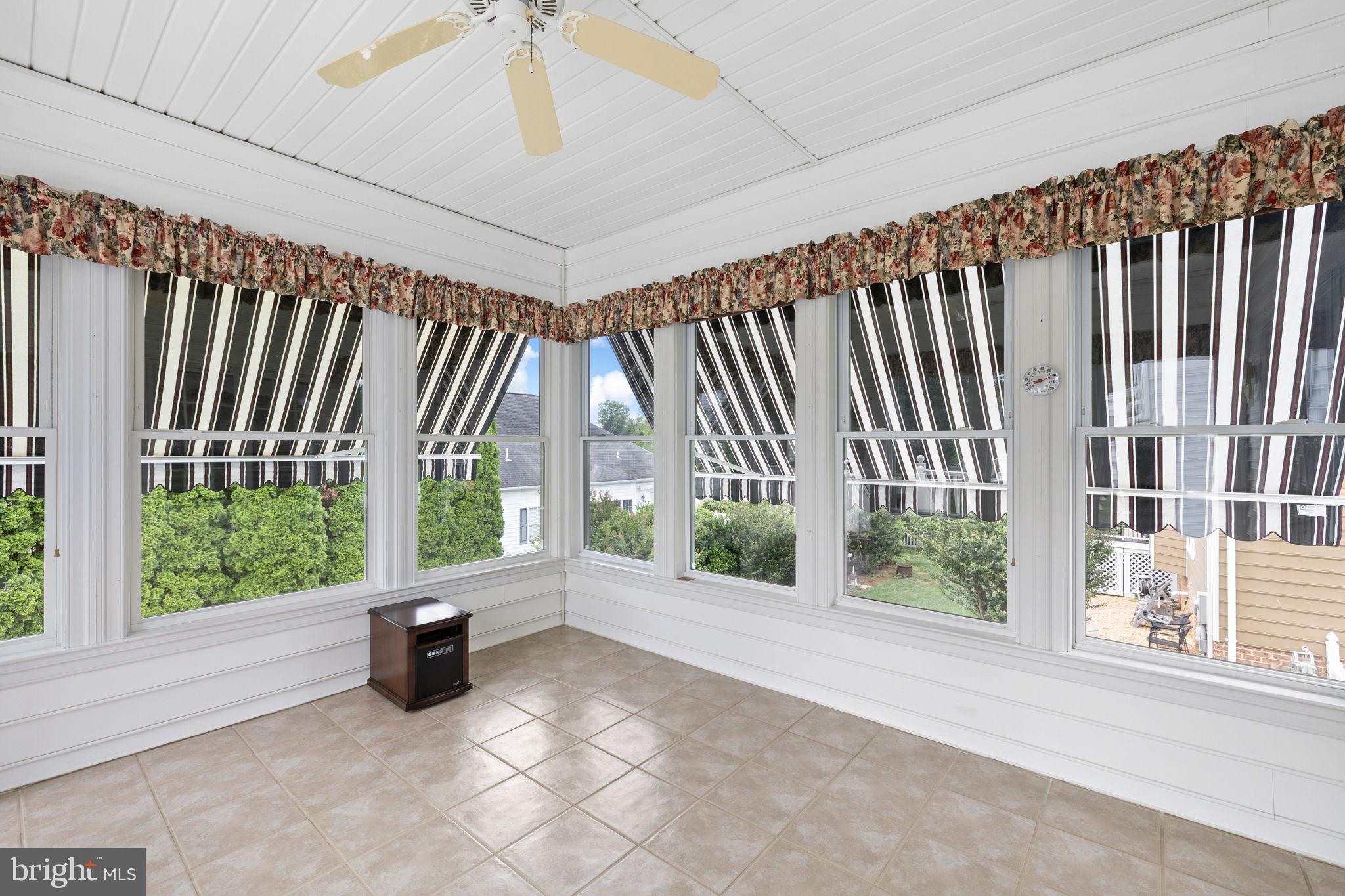 621 Country Club Road Culpeper, VA 22701 - Photo 27 of 45 Bright sunroom with charming views.