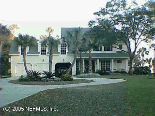 1252 Neck Road Ponte Vedra Beach, FL 32082 - Photo 1 of 1 a view of a house with a yard