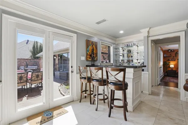 a view of a hallway and dining room