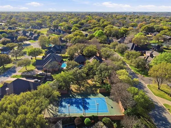 an aerial view of residential house with outdoor space