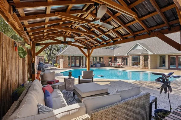 a outdoor space with patio lots of furniture and garden view