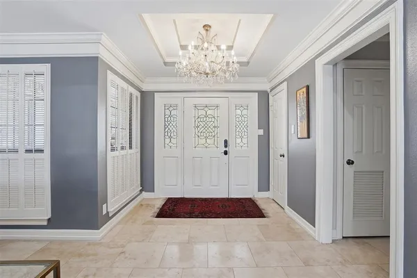 a view of entryway with chandelier